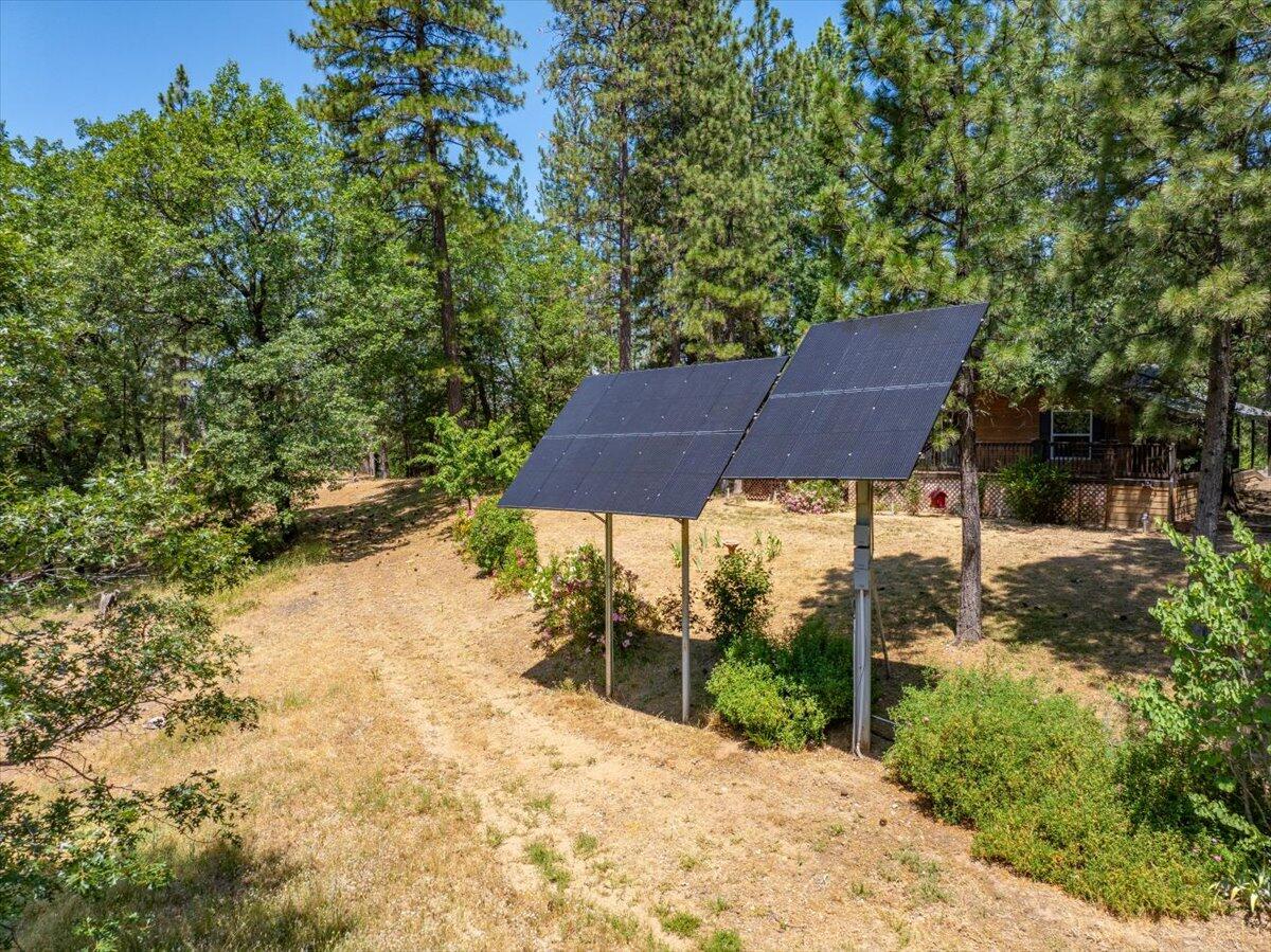 15288 Sherwood Forrest Road Oak Run, CA 96069 - Photo 77 of 91 a view of a backyard with sitting area