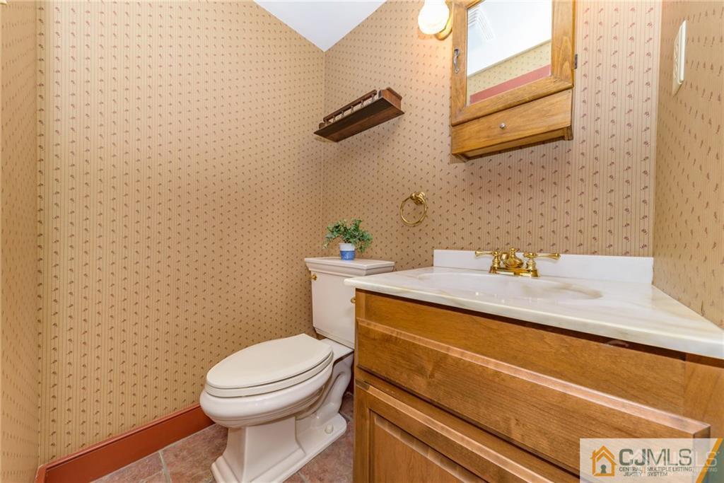 78 Yard Road Stockton, NJ 08559 - Photo 11 of 25 a bathroom with a sink and a toilet