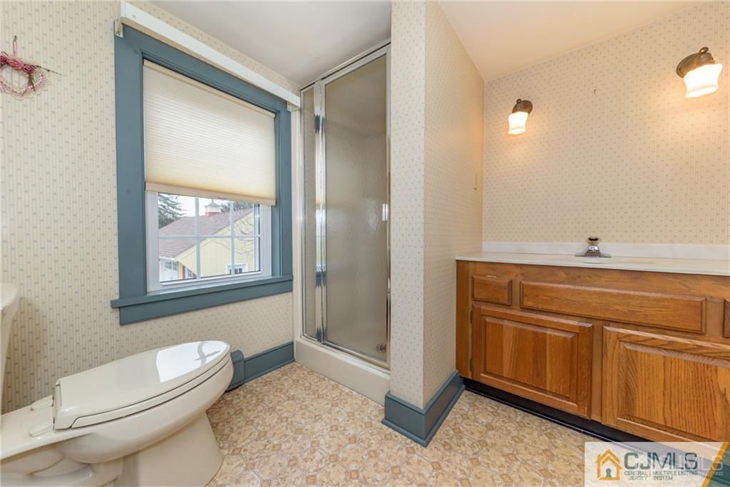 78 Yard Road Stockton, NJ 08559 - Photo 14 of 25 a bathroom with a sink a toilet and shower