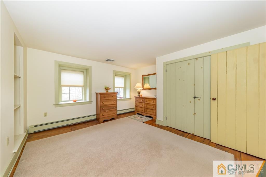 78 Yard Road Stockton, NJ 08559 - Photo 17 of 25 a view of an empty room with a window
