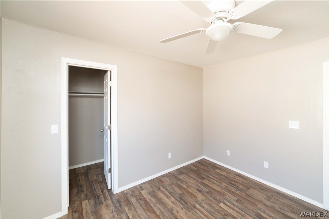 3556 North Willow Road Kingman, AZ 86409 - Photo 25 of 48 a view of an empty room with wooden floor