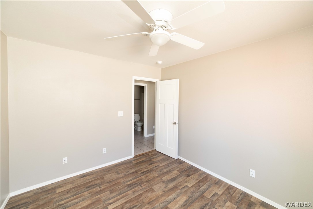 3556 North Willow Road Kingman, AZ 86409 - Photo 26 of 48 a view of an empty room with a fan