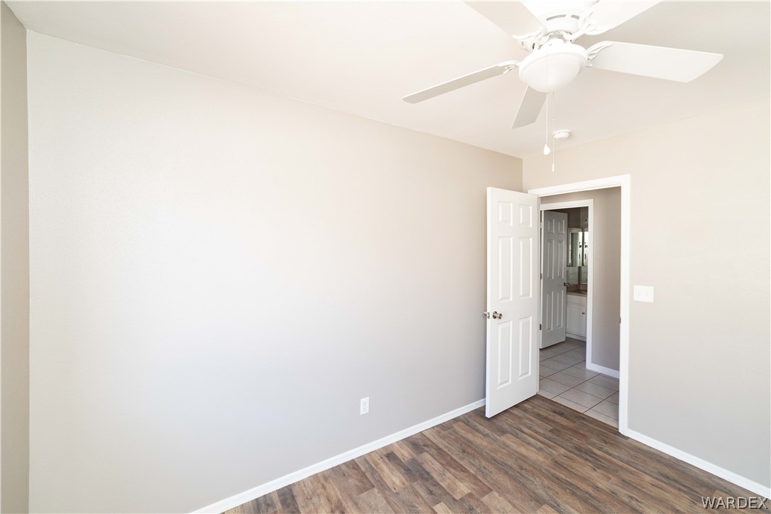 3556 North Willow Road Kingman, AZ 86409 - Photo 31 of 48 a view of an empty room with a fan