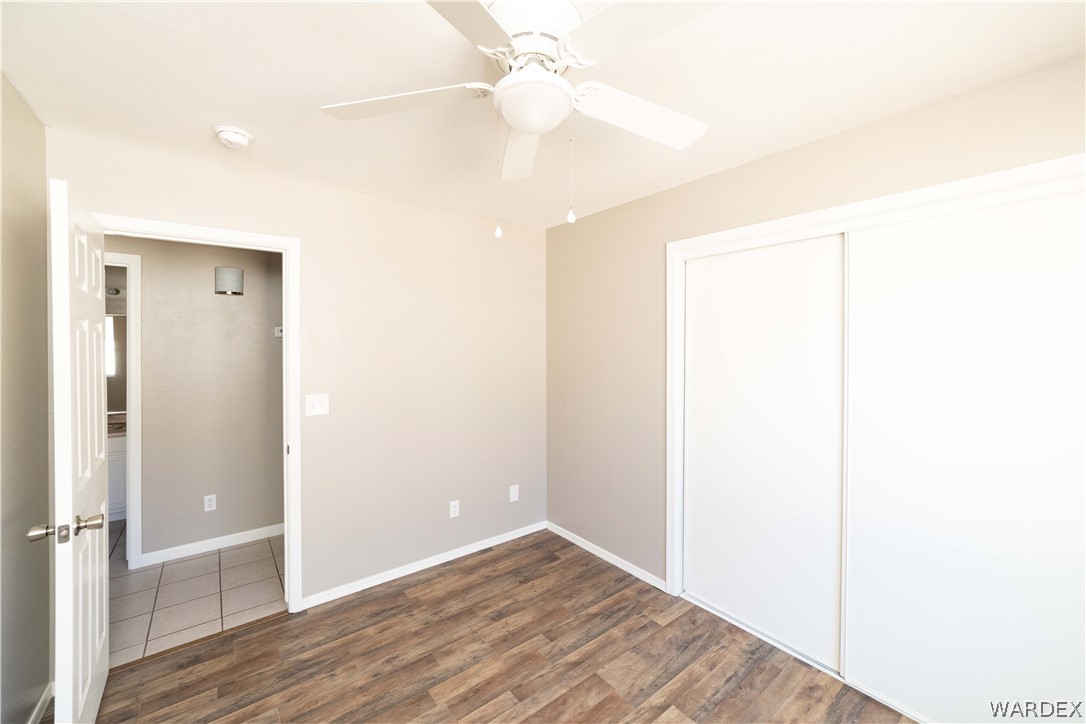 3556 North Willow Road Kingman, AZ 86409 - Photo 32 of 48 a view of a room with wooden floor