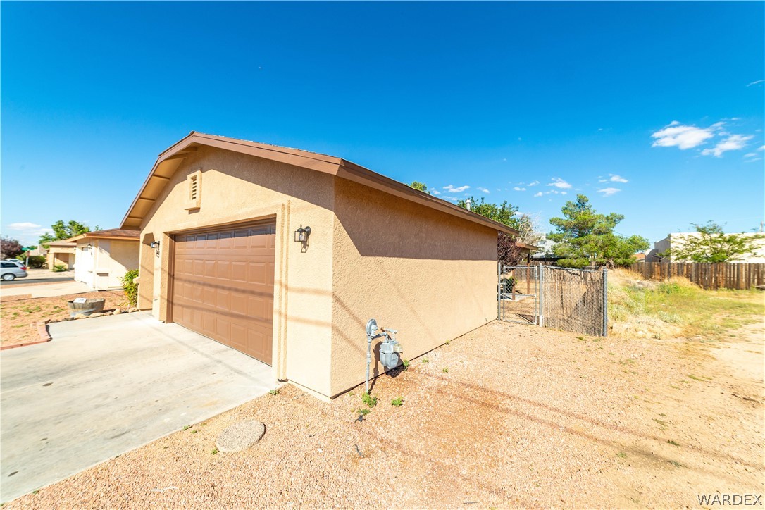 3556 North Willow Road Kingman, AZ 86409 - Photo 4 of 48 a view of a house with a outdoor space