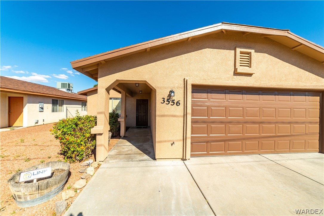 3556 North Willow Road Kingman, AZ 86409 - Photo 6 of 48 a front view of a house
