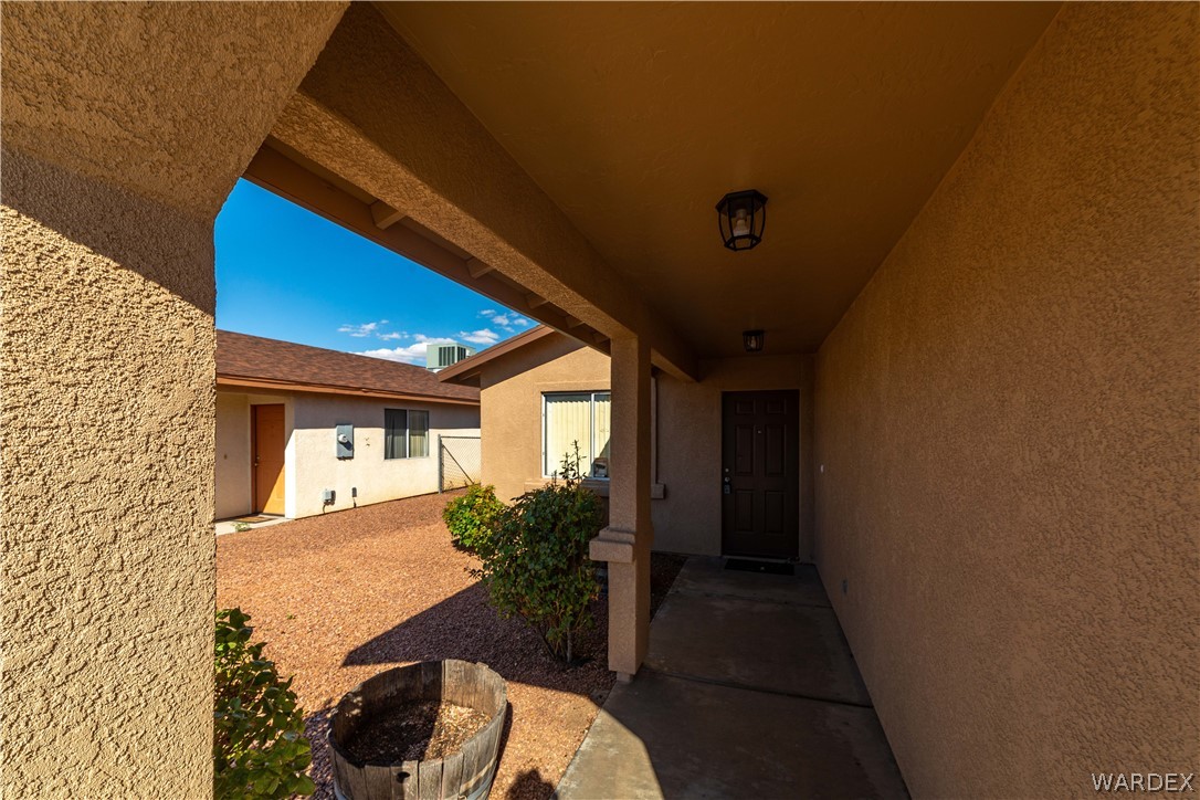 3556 North Willow Road Kingman, AZ 86409 - Photo 8 of 48 a view of house with backyard