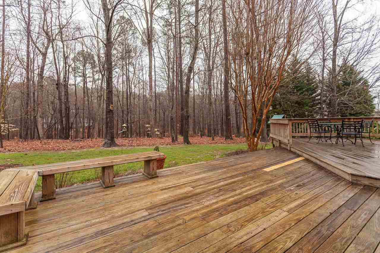 5404 Killarney Hope Drive Raleigh, NC 27613 - Photo 20 of 22 An alternate view of the deck and back yard space. Deck
