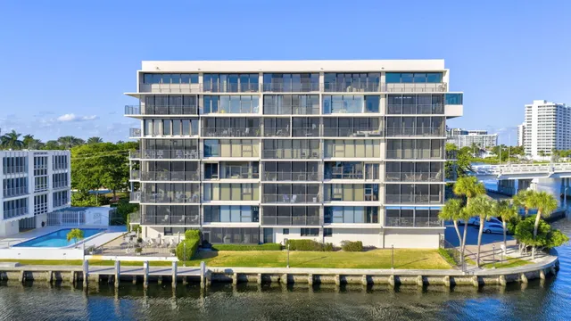 a view of a lake with a building in the background