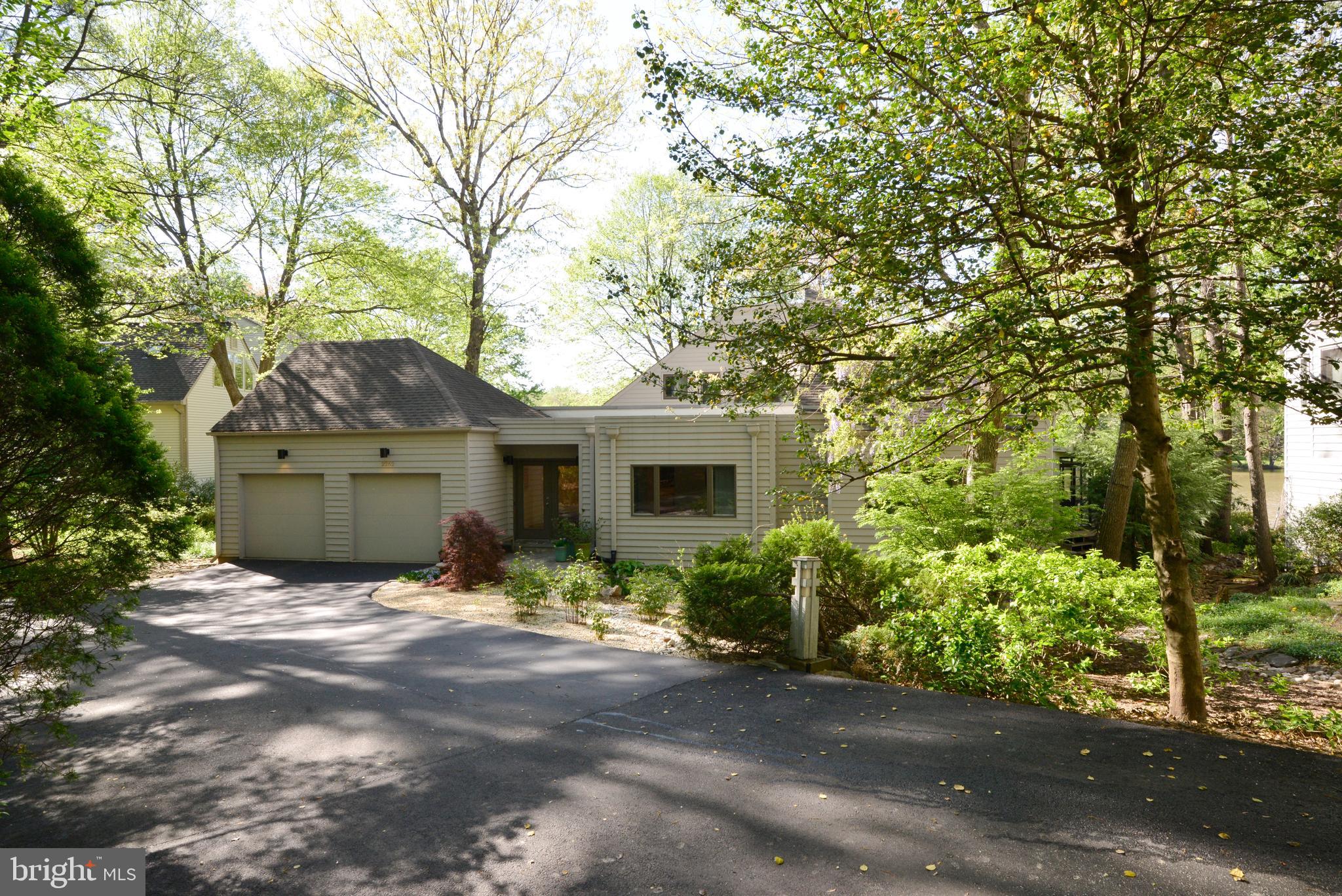 2262 Compass Point Lane Reston, VA 20191 - Photo 2 of 48 a view of a house with a tree and a yard
