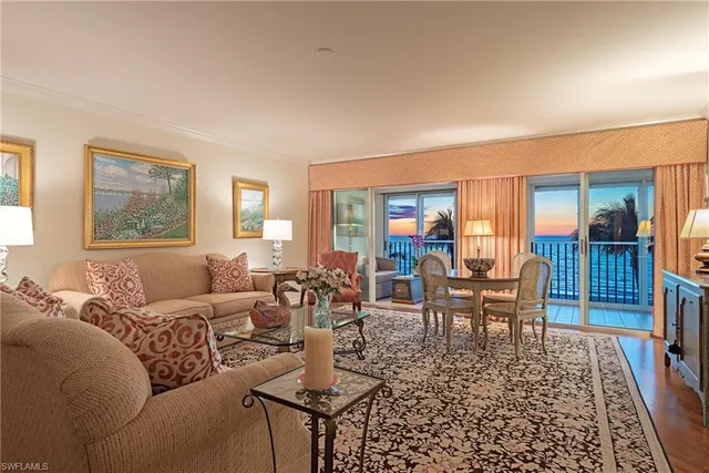 a kitchen with stainless steel appliances granite countertop a stove refrigerator and cabinets