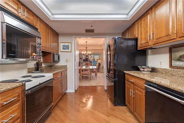 a view of a livingroom with furniture and workspace