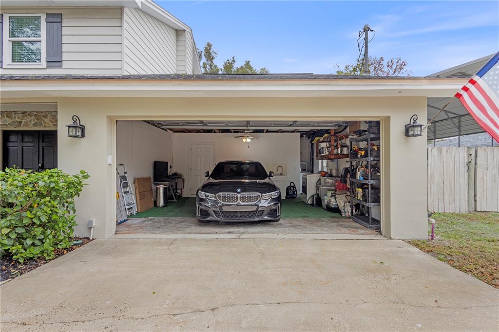 1437 Glenview Road Palm Harbor, FL 34683 - Photo 21 of 69 a car parked in front of a building