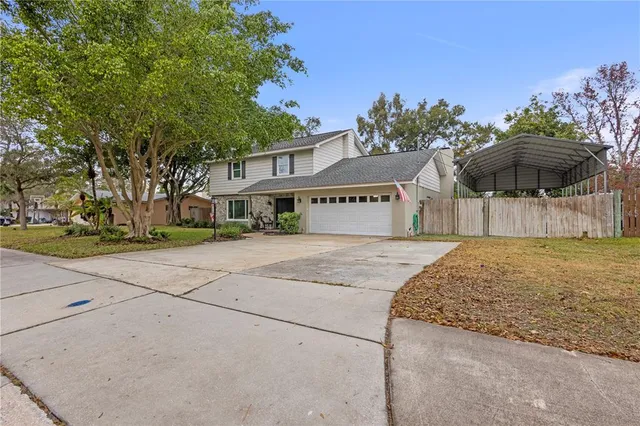 a kitchen with granite countertop lots of counter top space and stainless steel appliances
