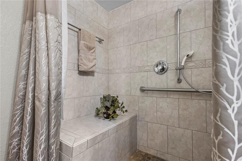 1437 Glenview Road Palm Harbor, FL 34683 - Photo 38 of 69 a bathroom with a shower