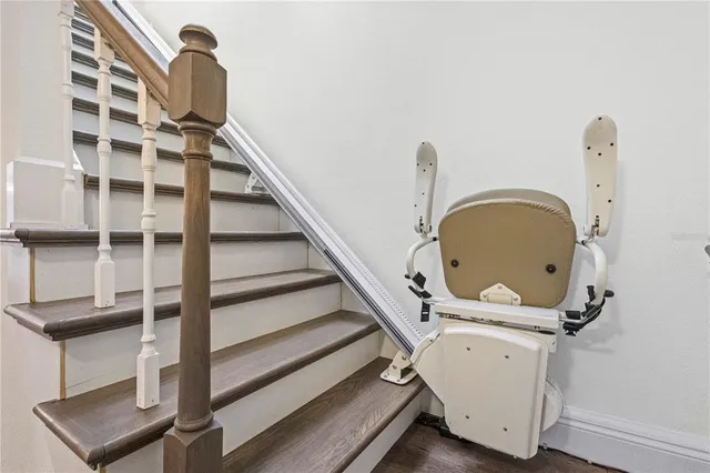 an aerial view of a house with a swimming pool