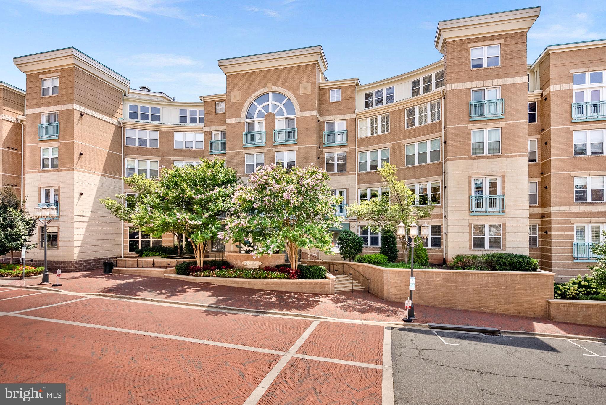 12001 Market Street, Unit 106 Reston, VA 20190 - Photo 1 of 45 a view of a building and street view