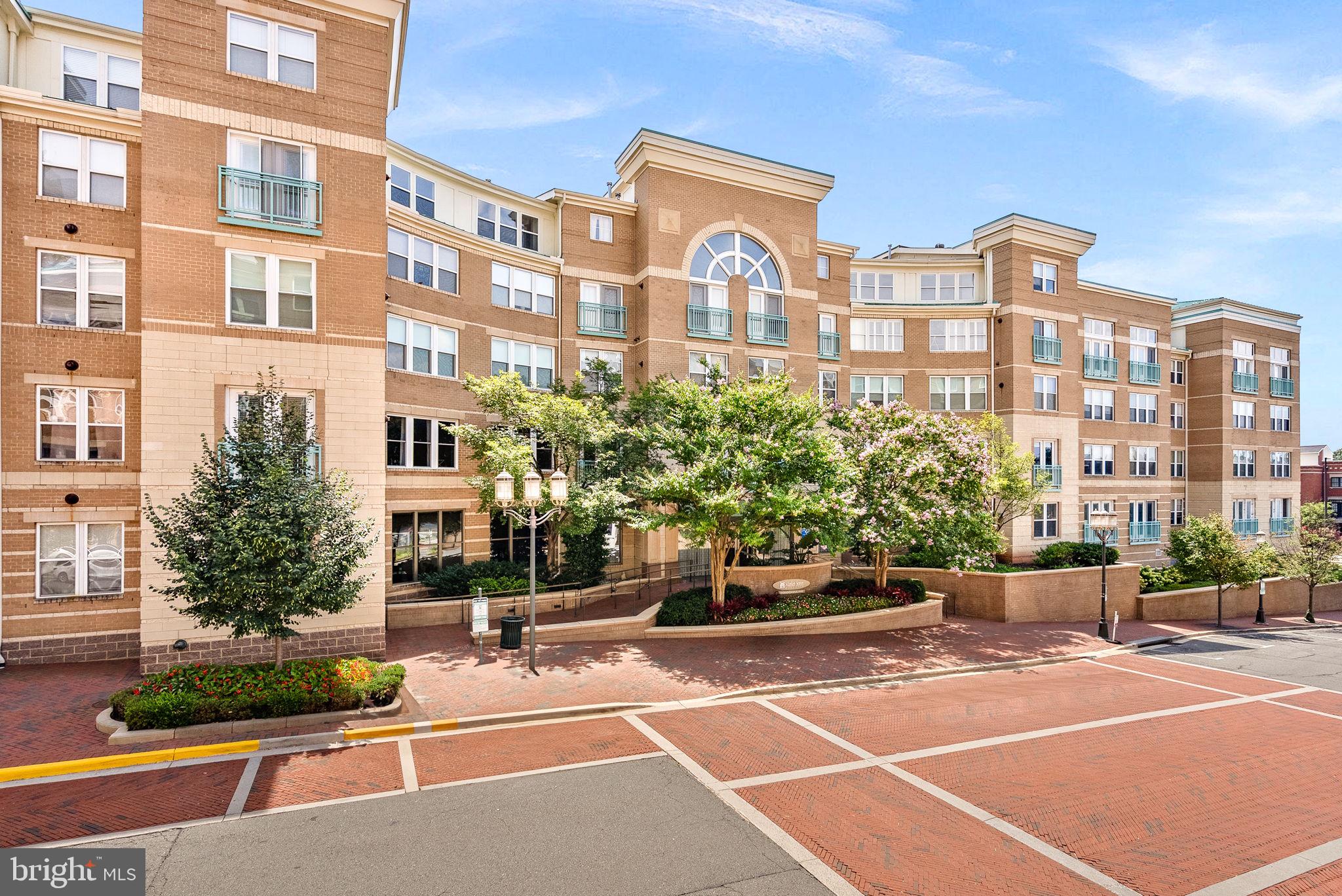 12001 Market Street, Unit 106 Reston, VA 20190 - Photo 2 of 45 a view of a city with tall buildings
