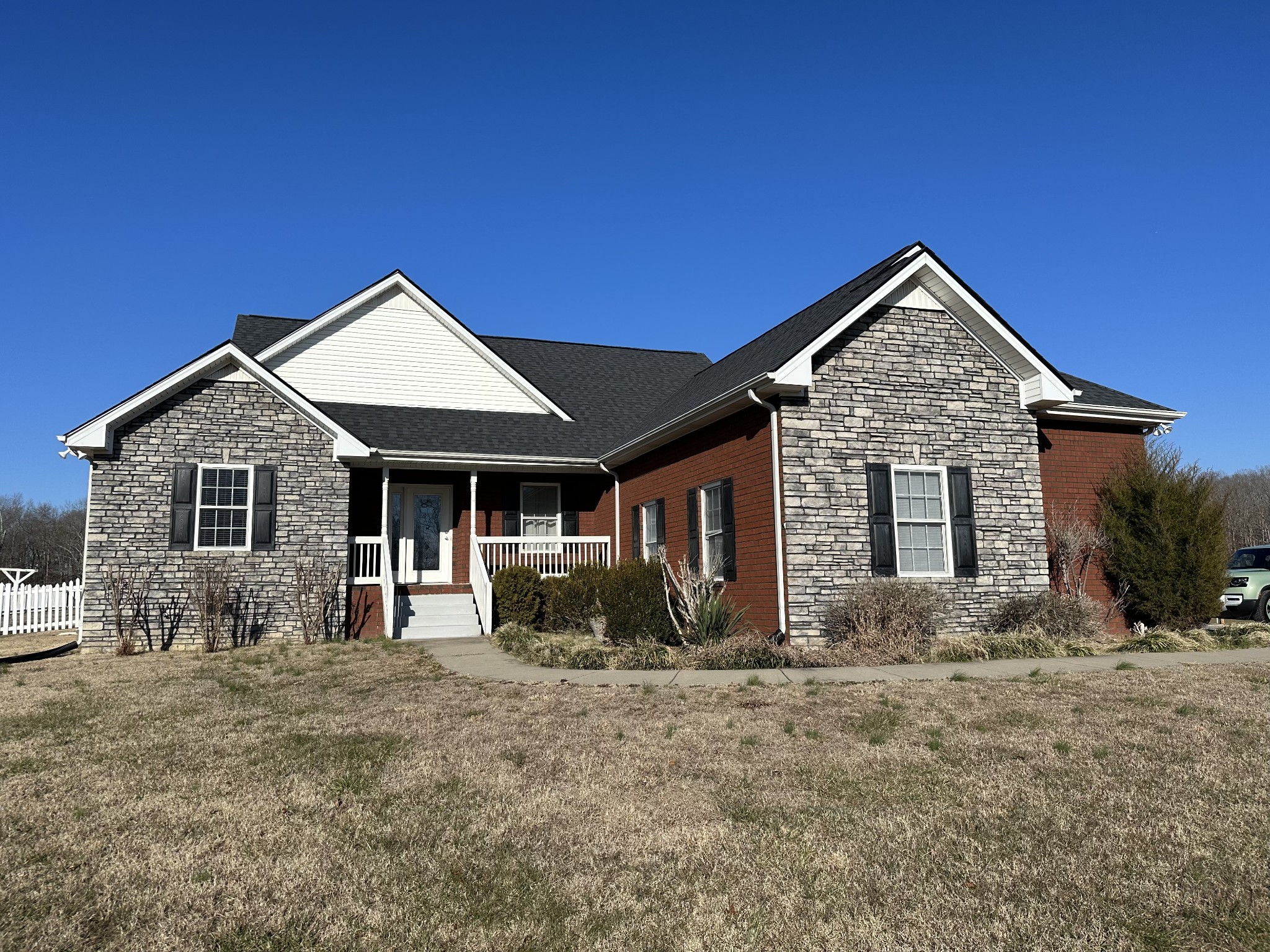423 Pruett Road Dickson, TN 37055 - Photo 1 of 36 a front view of a house with yard