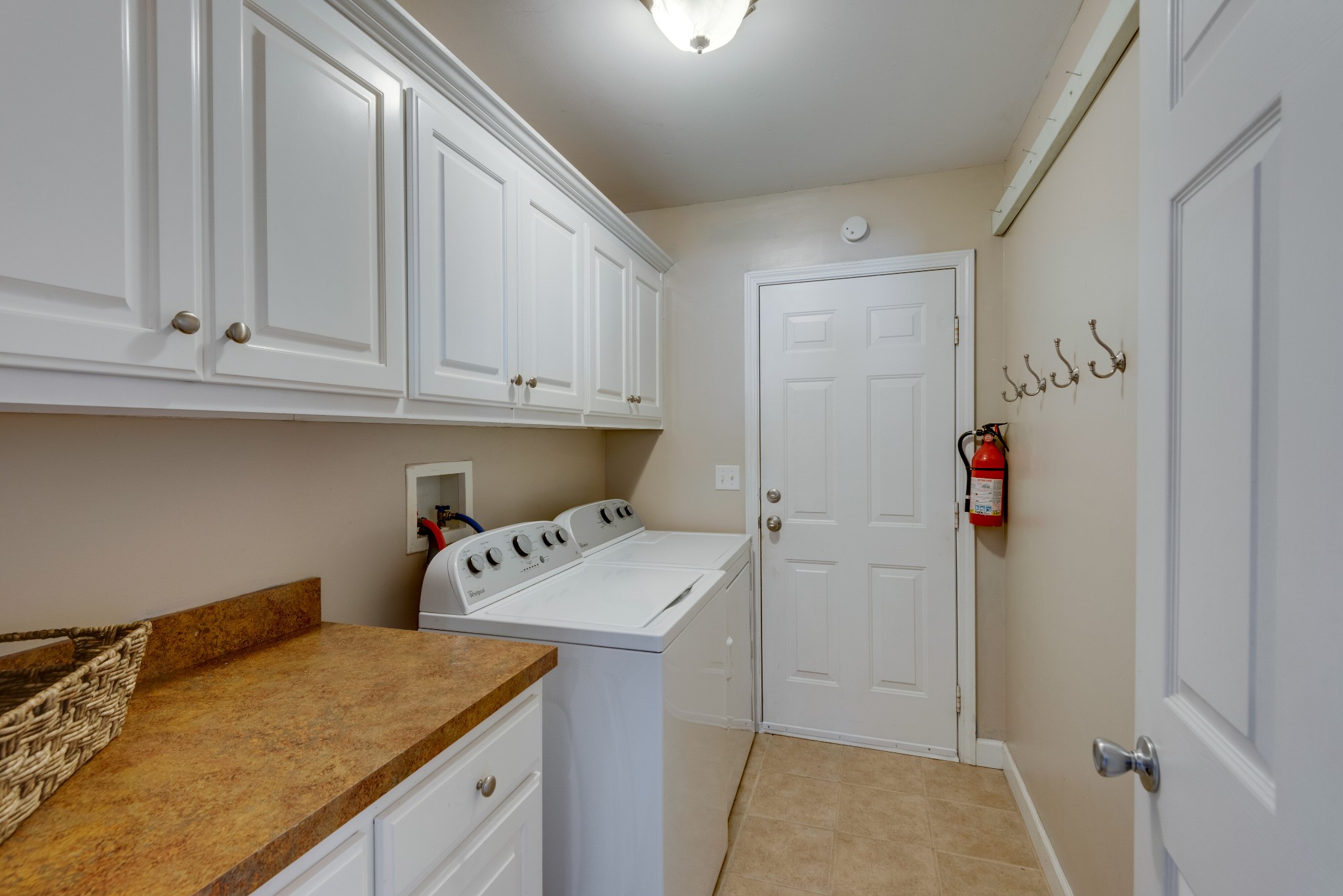 423 Pruett Road Dickson, TN 37055 - Photo 11 of 36 a utility room with faucet washer and dryer