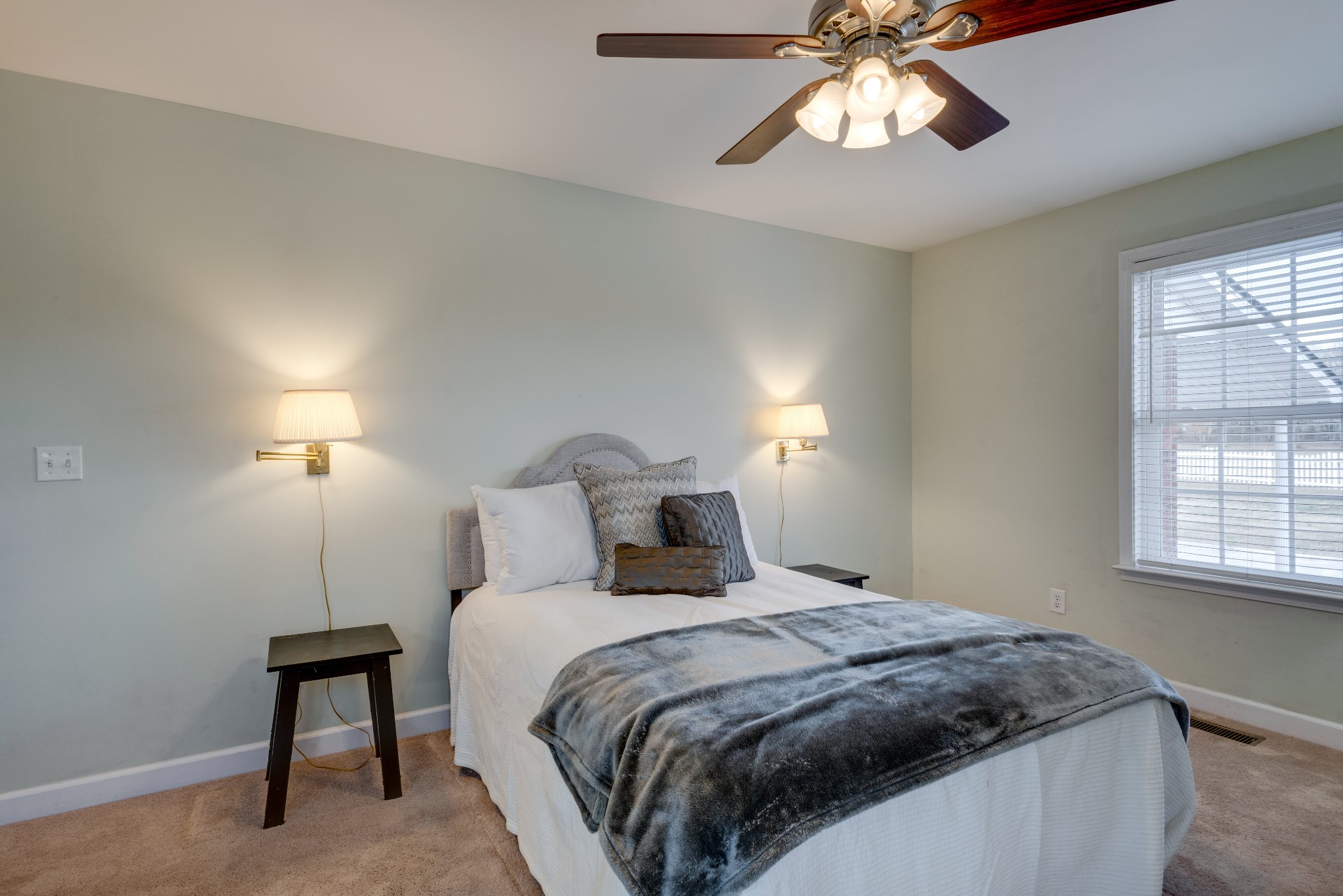 423 Pruett Road Dickson, TN 37055 - Photo 2 of 36 a bedroom with a bed and a chandelier