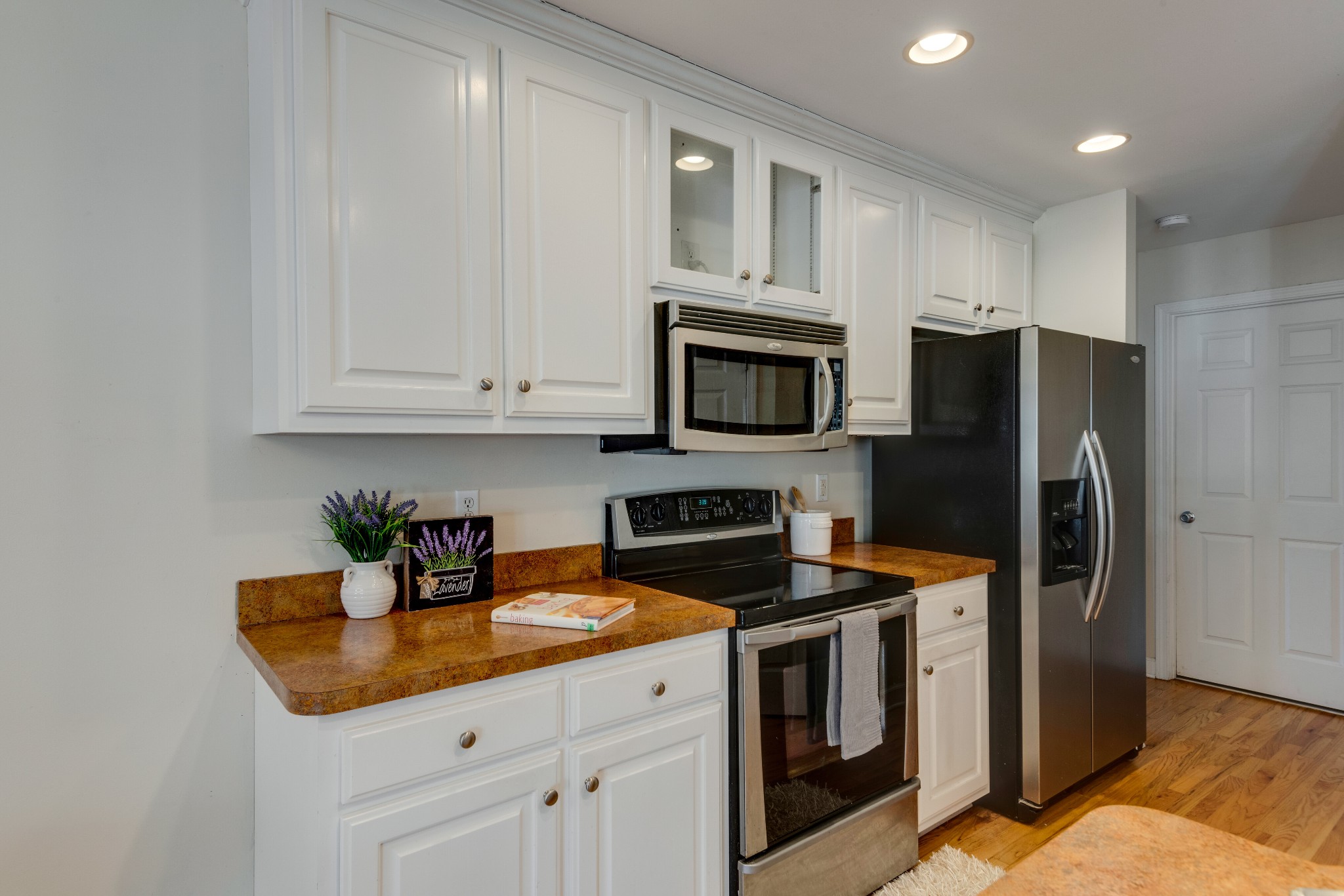 423 Pruett Road Dickson, TN 37055 - Photo 21 of 36 a kitchen with stainless steel appliances granite countertop a refrigerator a stove a sink and dishwasher