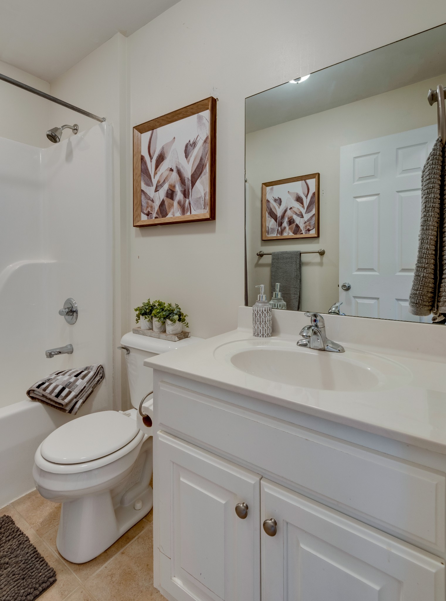 423 Pruett Road Dickson, TN 37055 - Photo 22 of 36 a bathroom with a toilet a sink and mirror