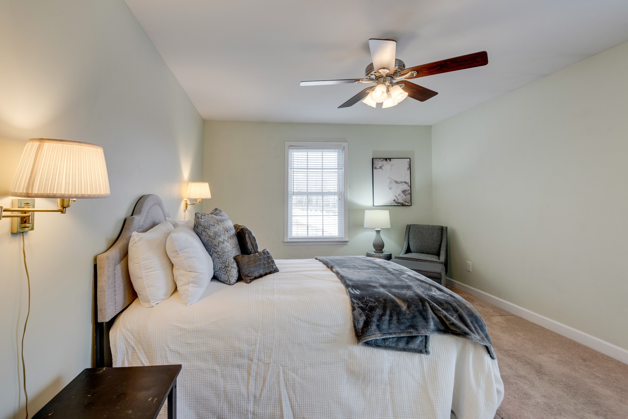 423 Pruett Road Dickson, TN 37055 - Photo 23 of 36 a bedroom with a bed and a lamp