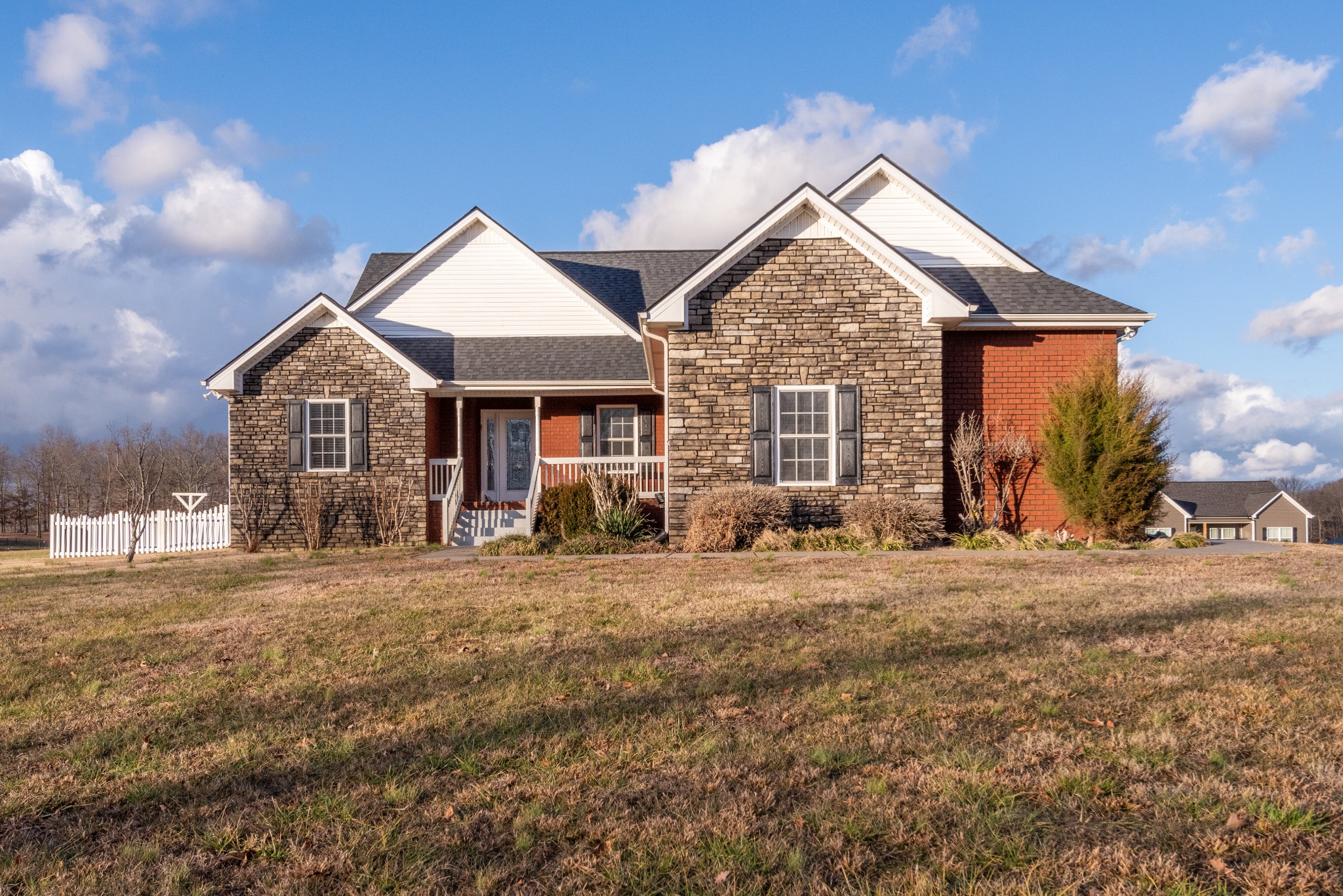 423 Pruett Road Dickson, TN 37055 - Photo 24 of 36 a front view of a house with a yard and garage