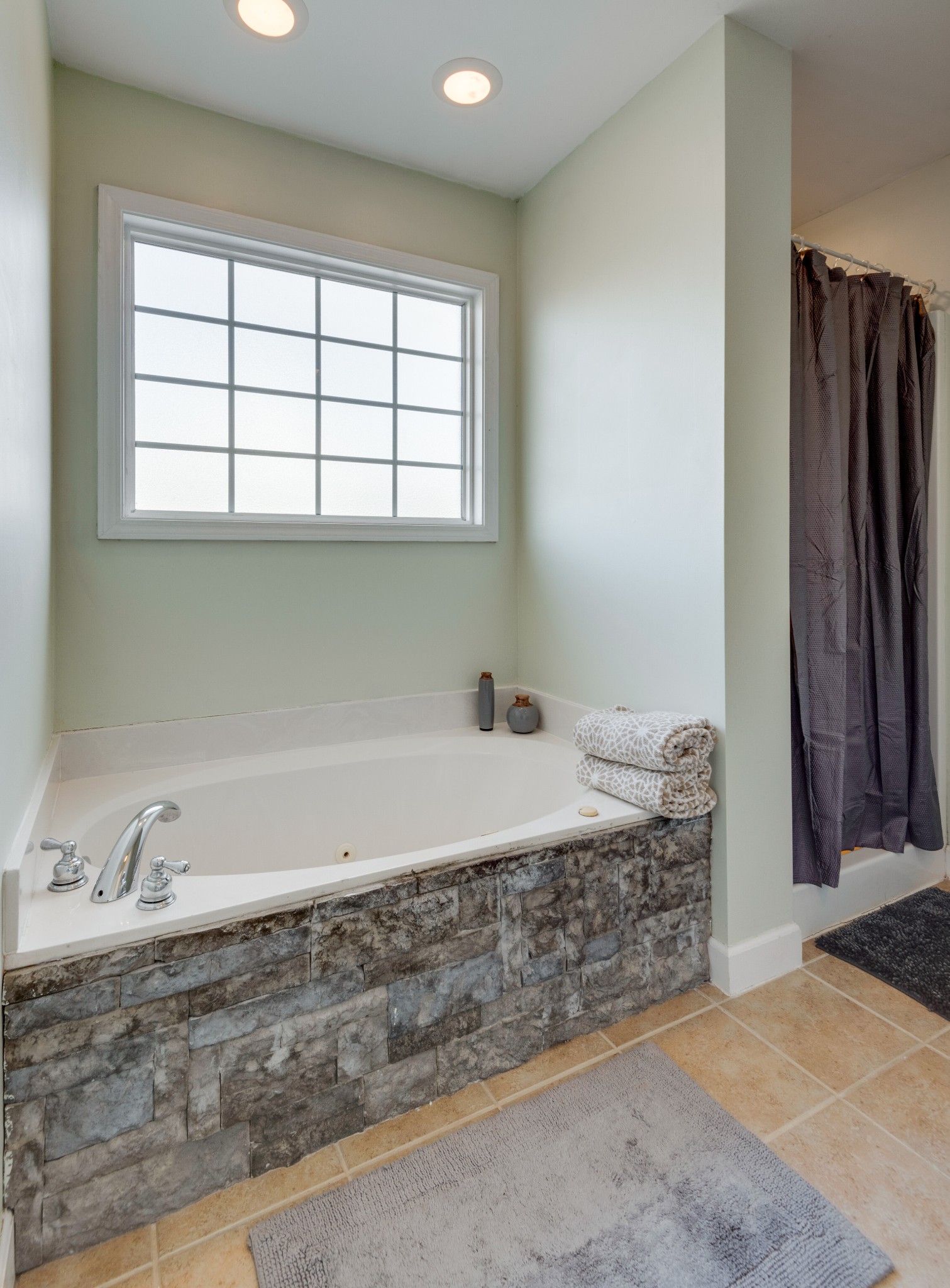 423 Pruett Road Dickson, TN 37055 - Photo 30 of 36 a spacious bedroom with a bed and a window