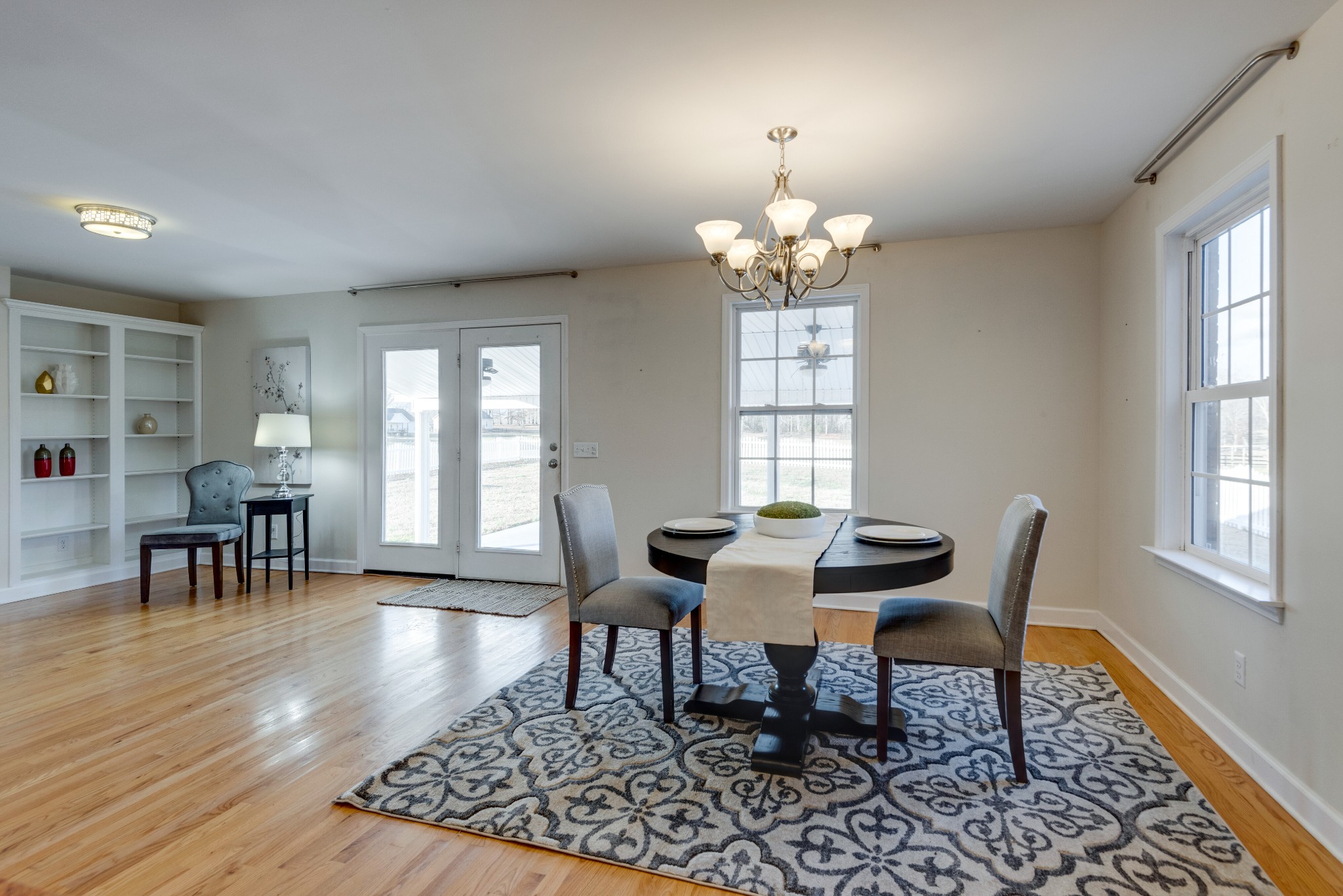 423 Pruett Road Dickson, TN 37055 - Photo 32 of 36 a view of a dining room with furniture window and wooden floor