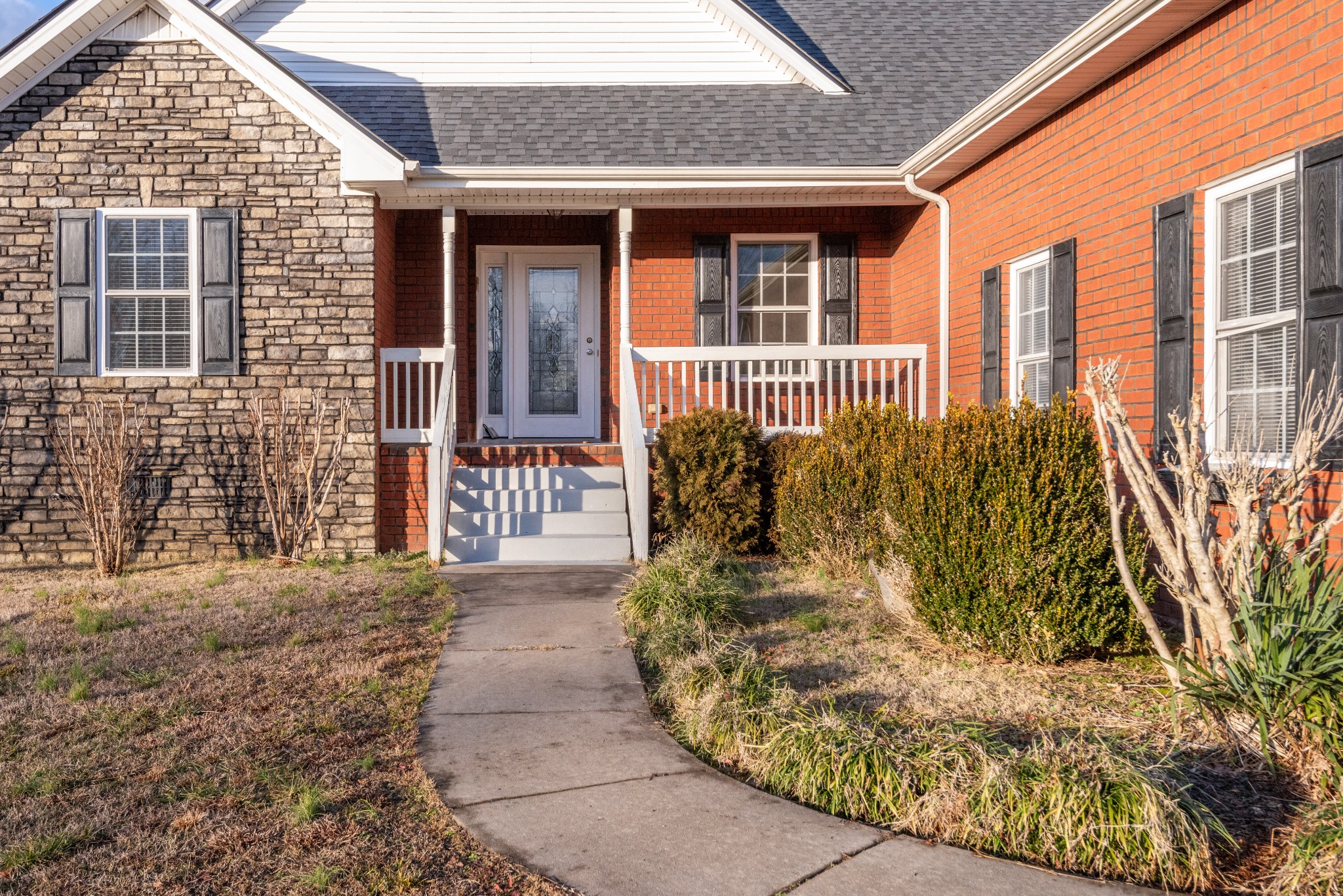 423 Pruett Road Dickson, TN 37055 - Photo 34 of 36 a view of a brick house with many windows