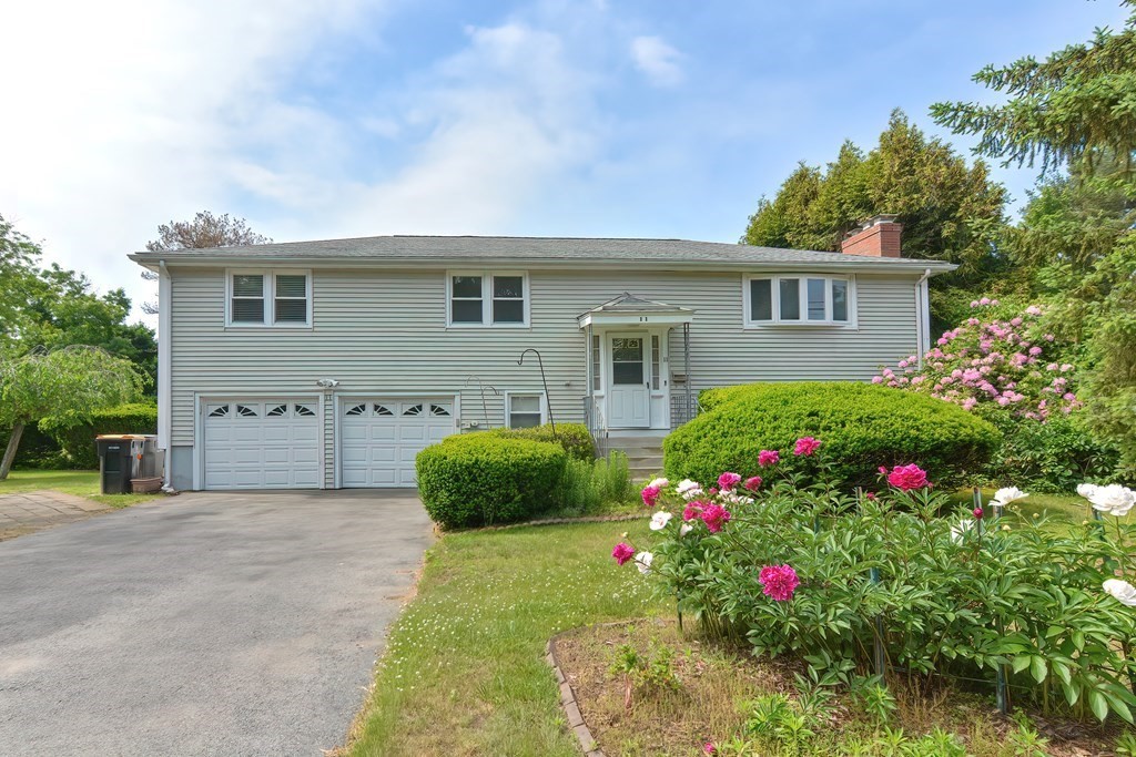 11 Bellwood Way Framingham, MA 01701 - Photo 1 of 42 a house view with a garden space