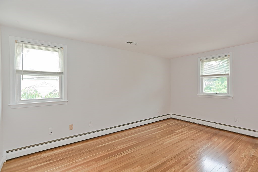 11 Bellwood Way Framingham, MA 01701 - Photo 23 of 42 a view of empty room with wooden floor