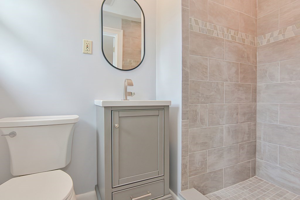 11 Bellwood Way Framingham, MA 01701 - Photo 24 of 42 a bathroom with a toilet and a sink