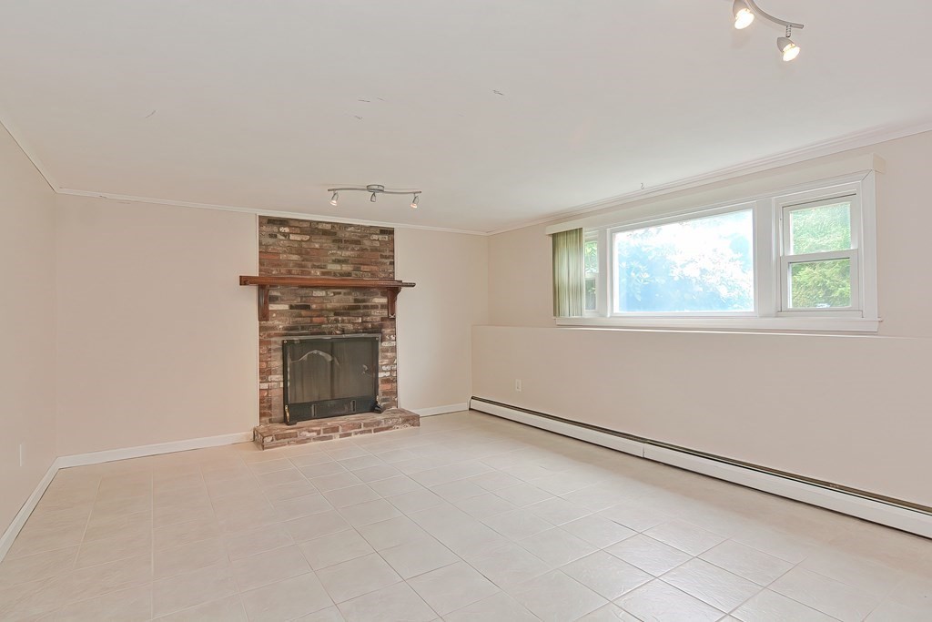 11 Bellwood Way Framingham, MA 01701 - Photo 28 of 42 an empty room with windows