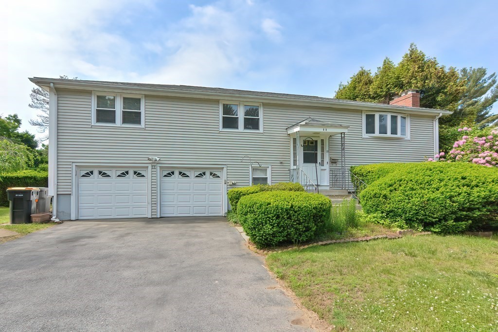 11 Bellwood Way Framingham, MA 01701 - Photo 42 of 42 a front view of a house with garden