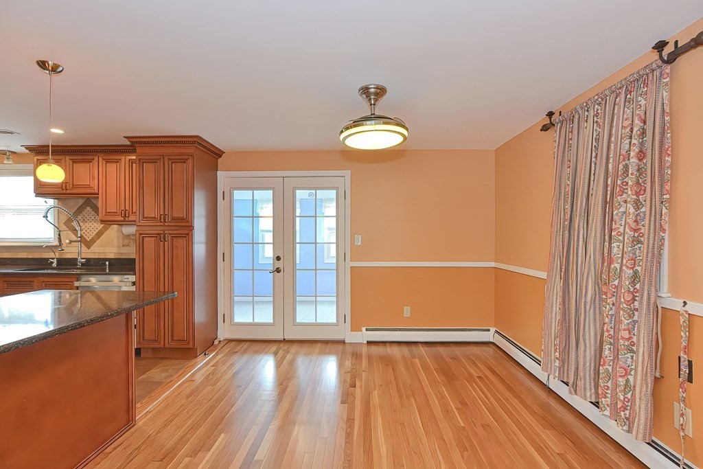 11 Bellwood Way Framingham, MA 01701 - Photo 8 of 42 wooden floor in an empty room with a window