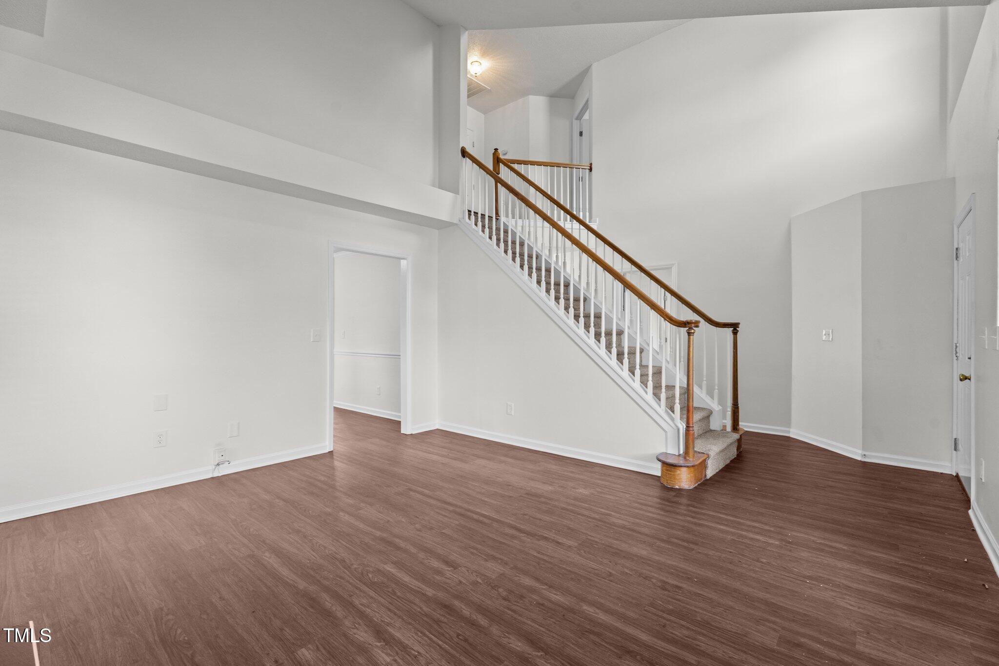 3624 Singleleaf Lane Raleigh, NC 27616 - Photo 11 of 40 a view of an entryway with wooden floor
