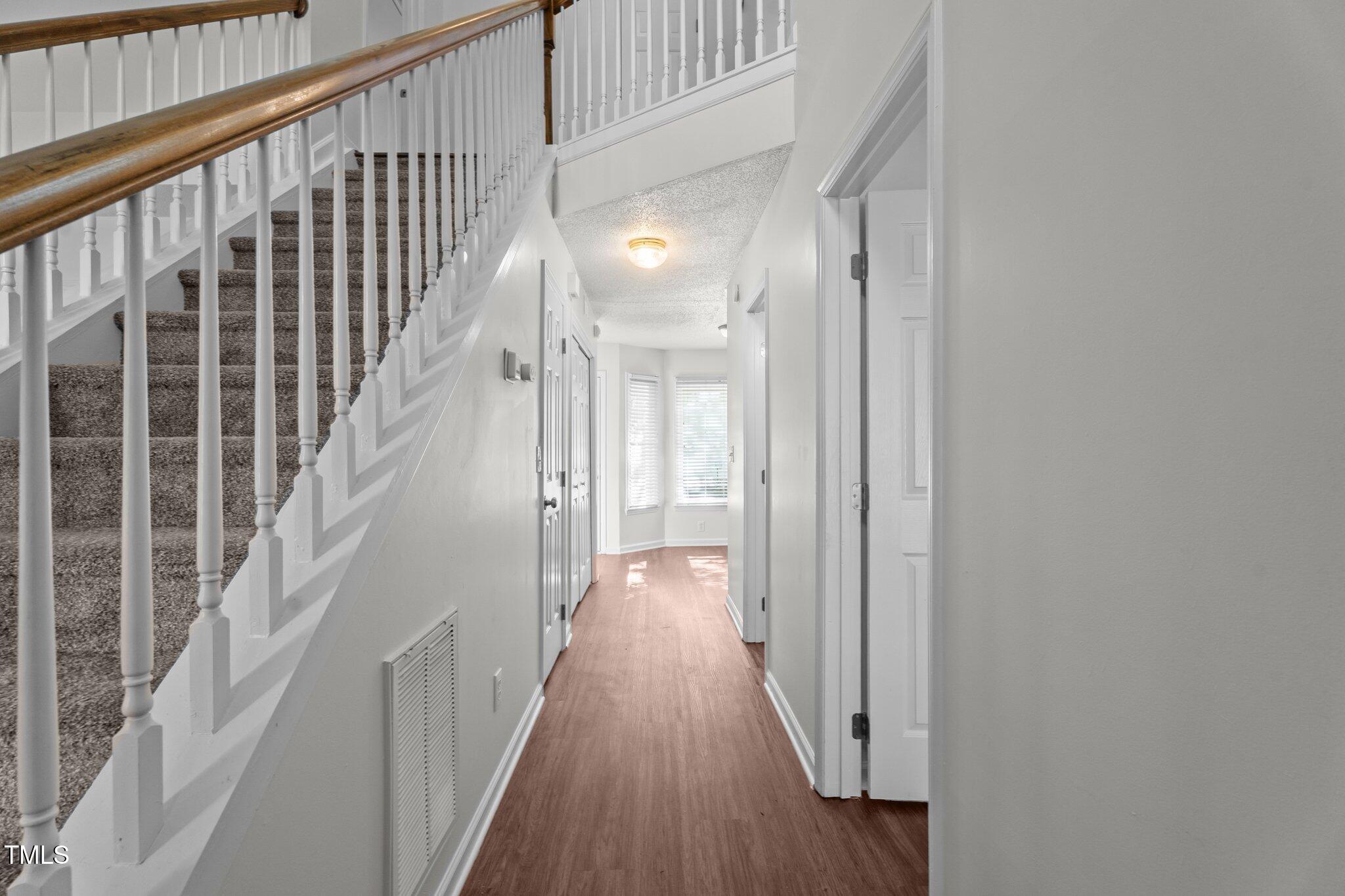 3624 Singleleaf Lane Raleigh, NC 27616 - Photo 24 of 40 a view of gallery with wooden floor