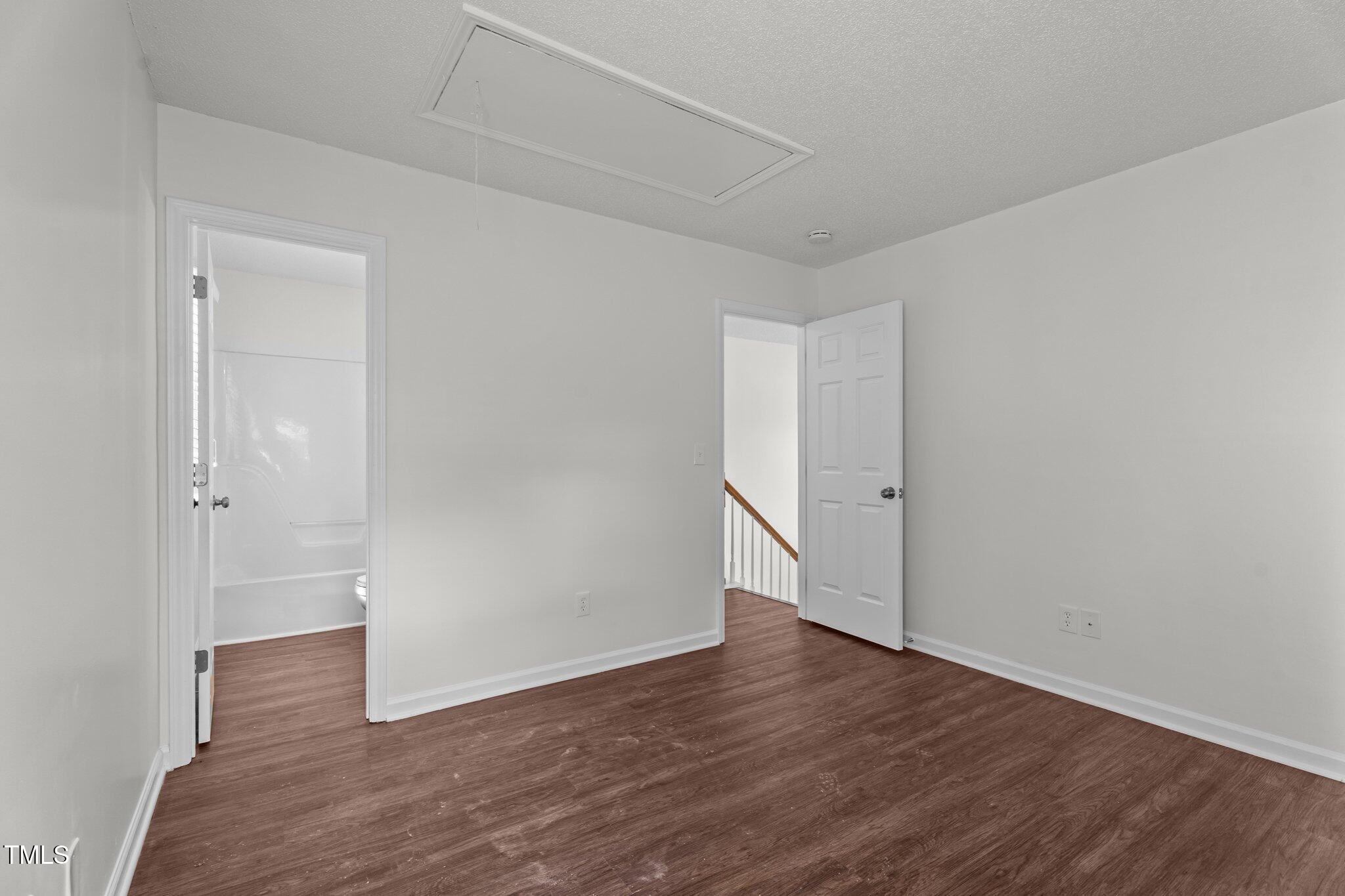 3624 Singleleaf Lane Raleigh, NC 27616 - Photo 26 of 40 a view of an empty room with wooden floor