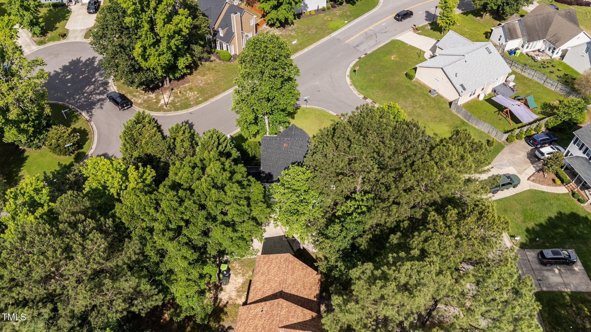 3624 Singleleaf Lane Raleigh, NC 27616 - Photo 39 of 40 an aerial view of a house with swimming pool and garden view