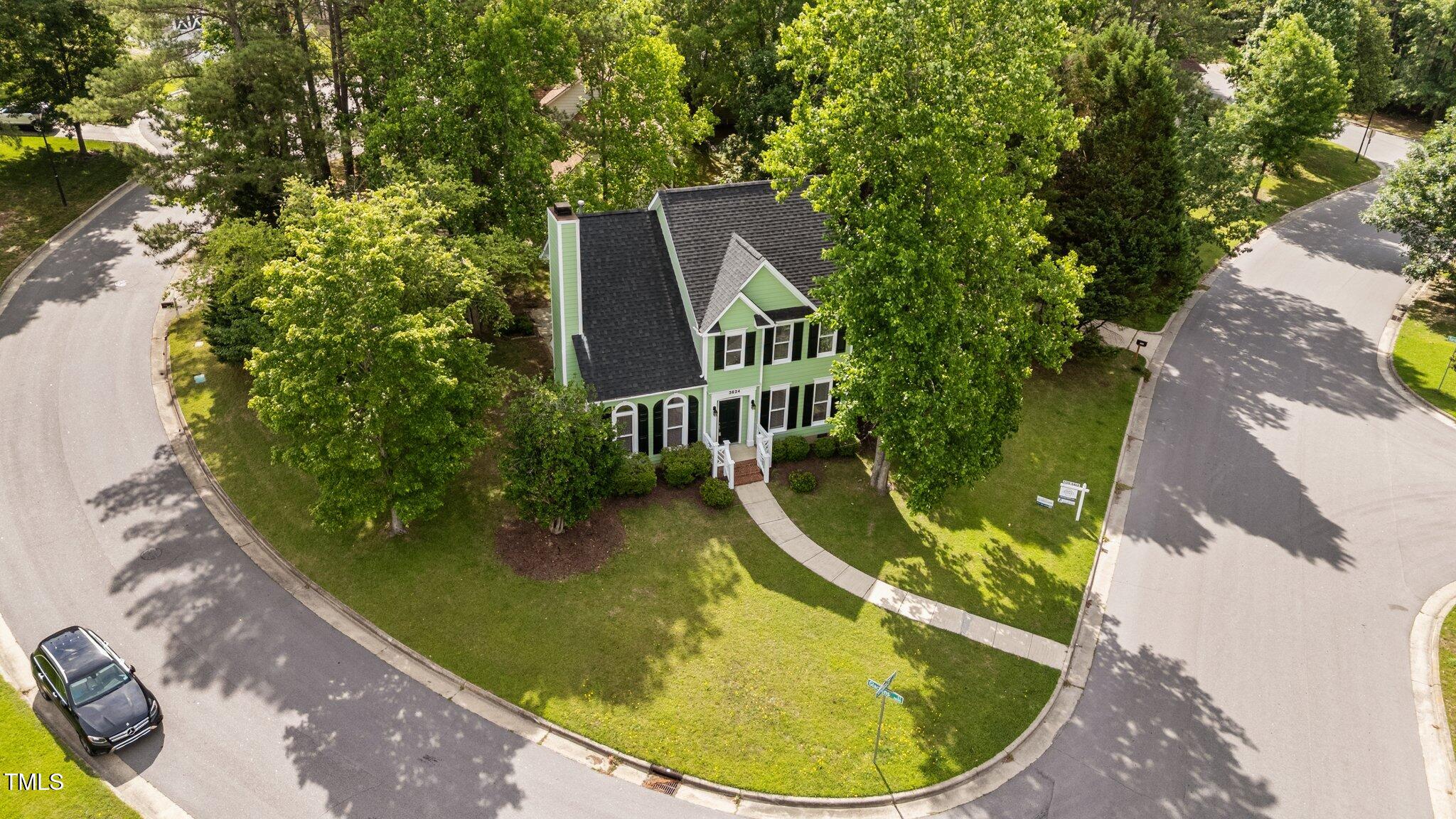 3624 Singleleaf Lane Raleigh, NC 27616 - Photo 40 of 40 a view of a swimming pool with a garden