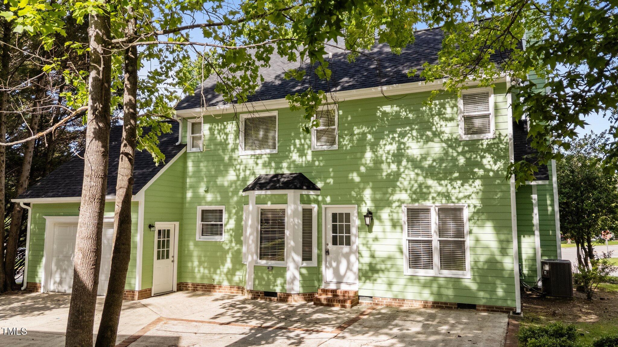 3624 Singleleaf Lane Raleigh, NC 27616 - Photo 6 of 40 a front view of a house with a garden