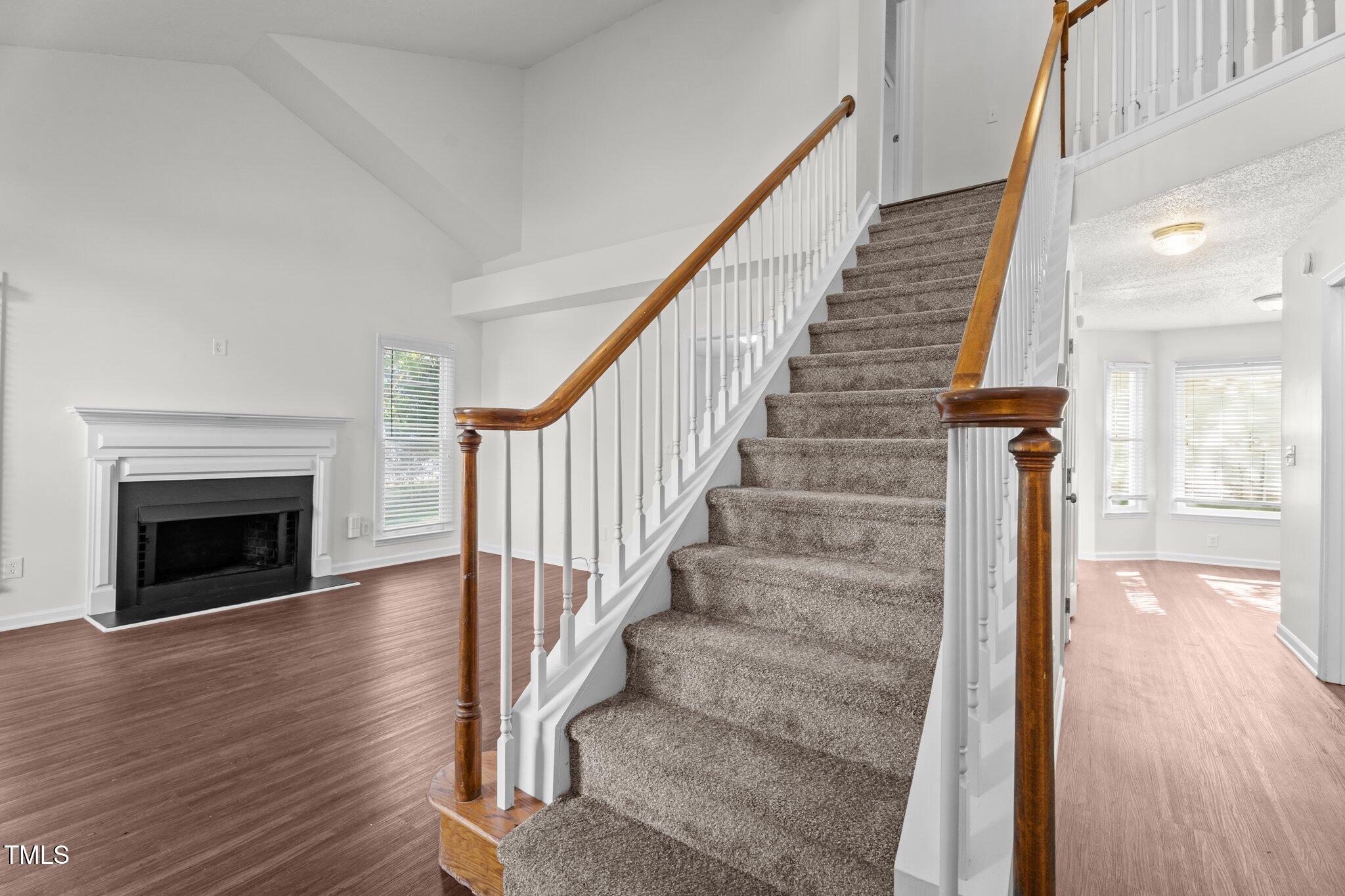 3624 Singleleaf Lane Raleigh, NC 27616 - Photo 8 of 40 a view of entryway and hall with wooden floor
