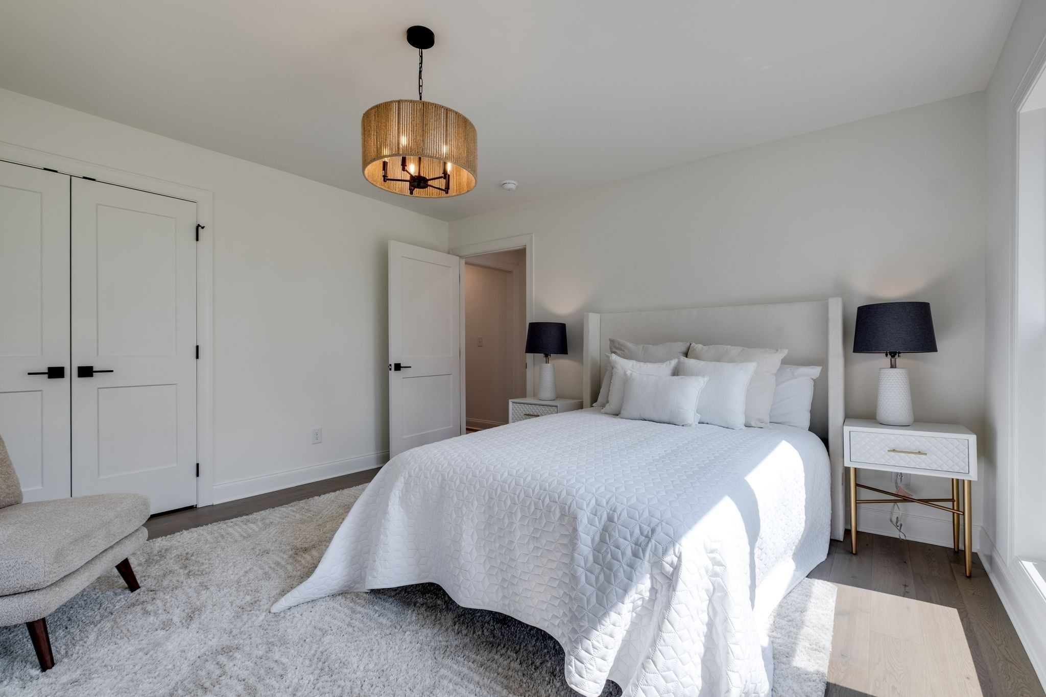 1510 East Piney Road Dickson, TN 37055 - Photo 41 of 66 a bedroom with a bed and a chandelier