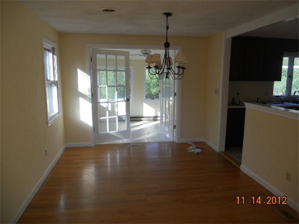 6 Lewis Road Foxboro, MA 02035 - Photo 4 of 12 a view of empty room with wooden floor and fan