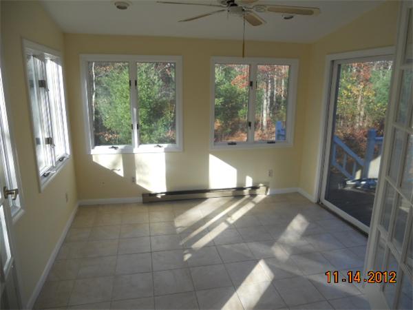 6 Lewis Road Foxboro, MA 02035 - Photo 5 of 12 a view of an empty room with a window