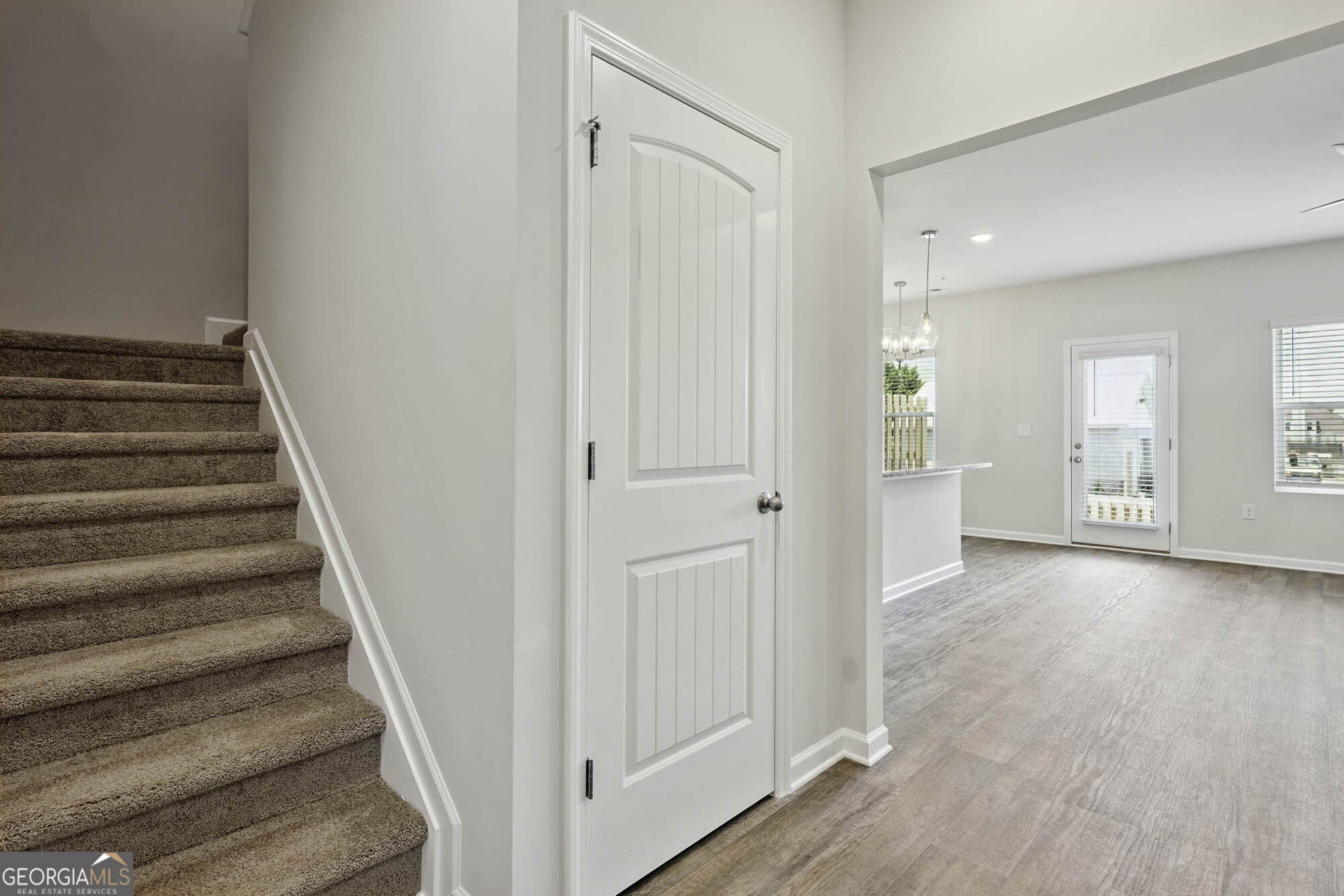 11516 Kimberly Way Hampton, GA 30228 - Photo 6 of 39 a view of an entryway with wooden floor