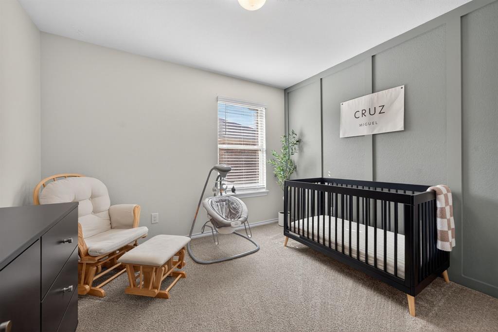 800 Rustic Way Royse City, TX 75189 - Photo 11 of 21 a bedroom with furniture and a window